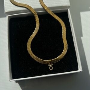 Icy “Taurus” Gold plated Zodiac Herringbone Snake CZ Charm Necklace